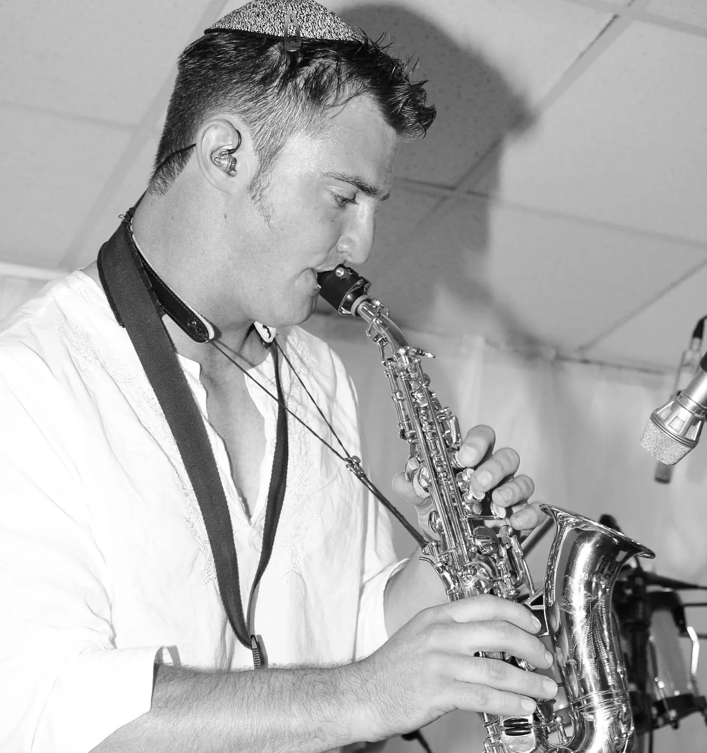 George Kash playing soprano sax at a wedding
