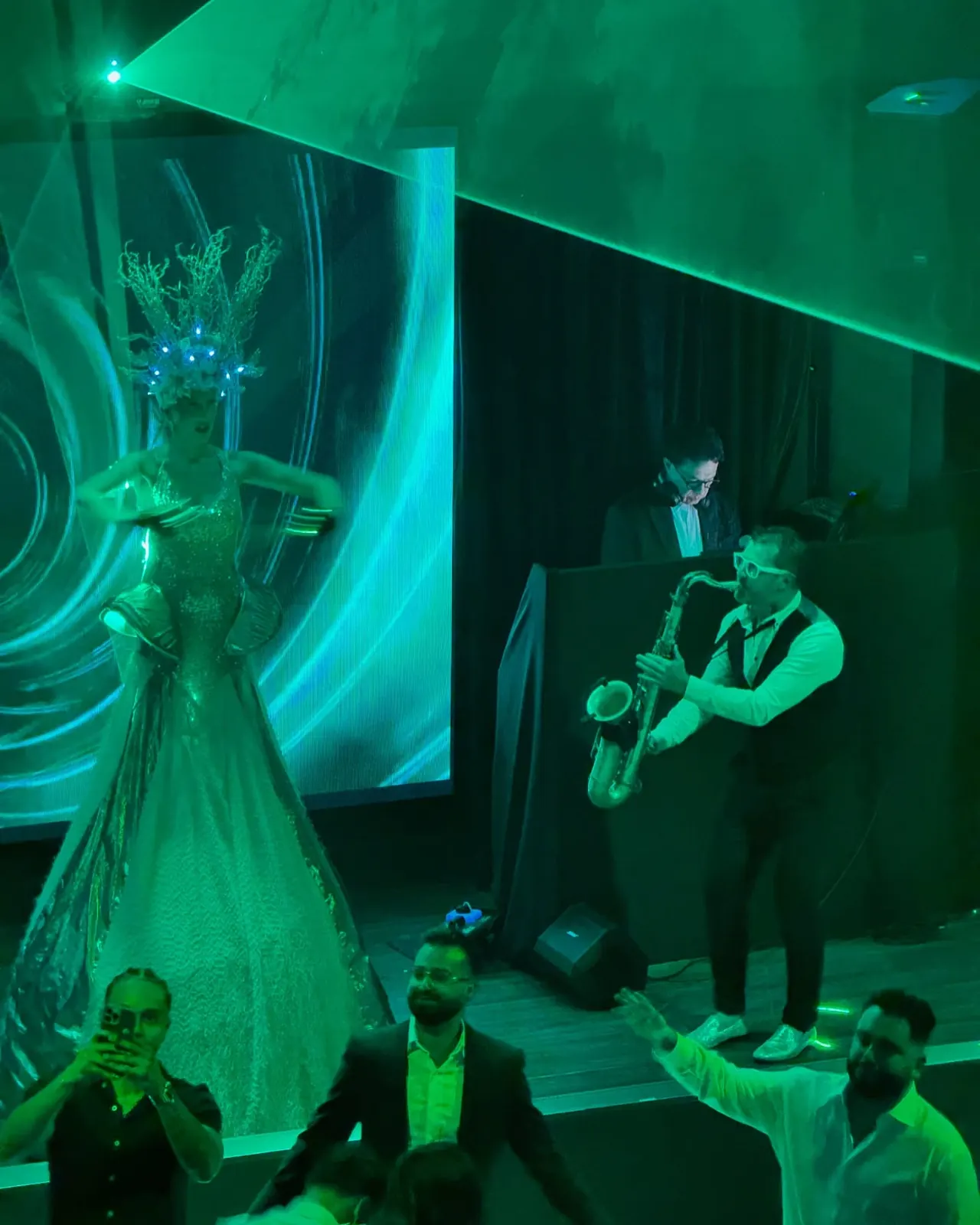 Saxophonist on stage at a wedding reception